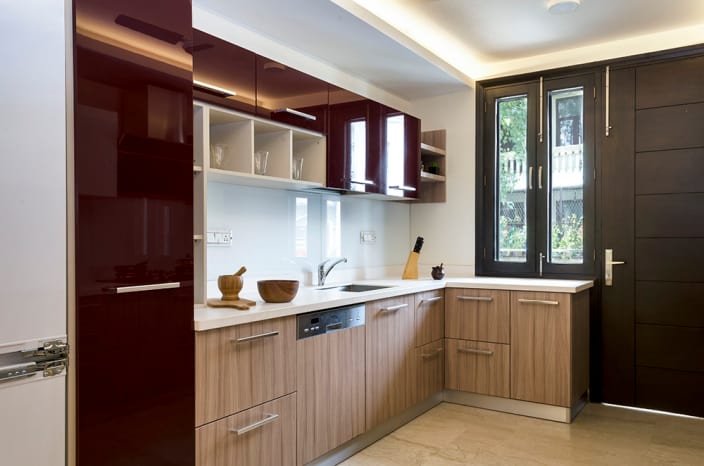 Brown L Shaped Kitchen And Maroon Cabinets by Mridul Jain - UrbanClap